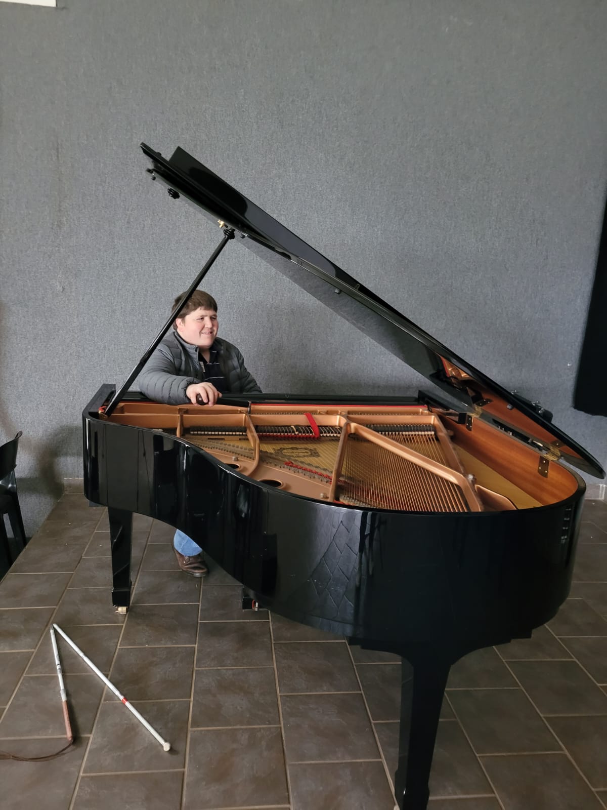 Dewald tuning a Yamaha Grand Piano